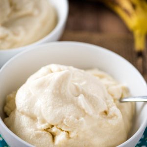 white bowl of soft serve homemade banana ice cream with spoon