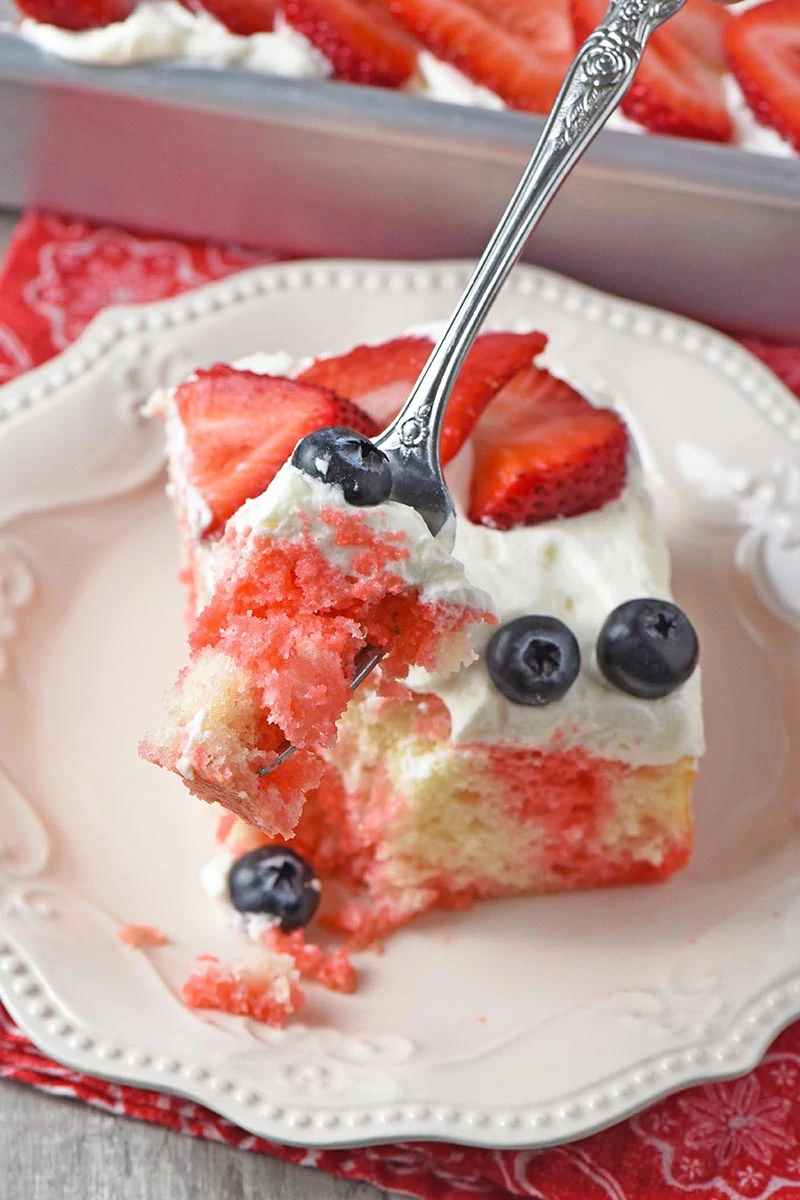bite of strawberry Jello cake on fork