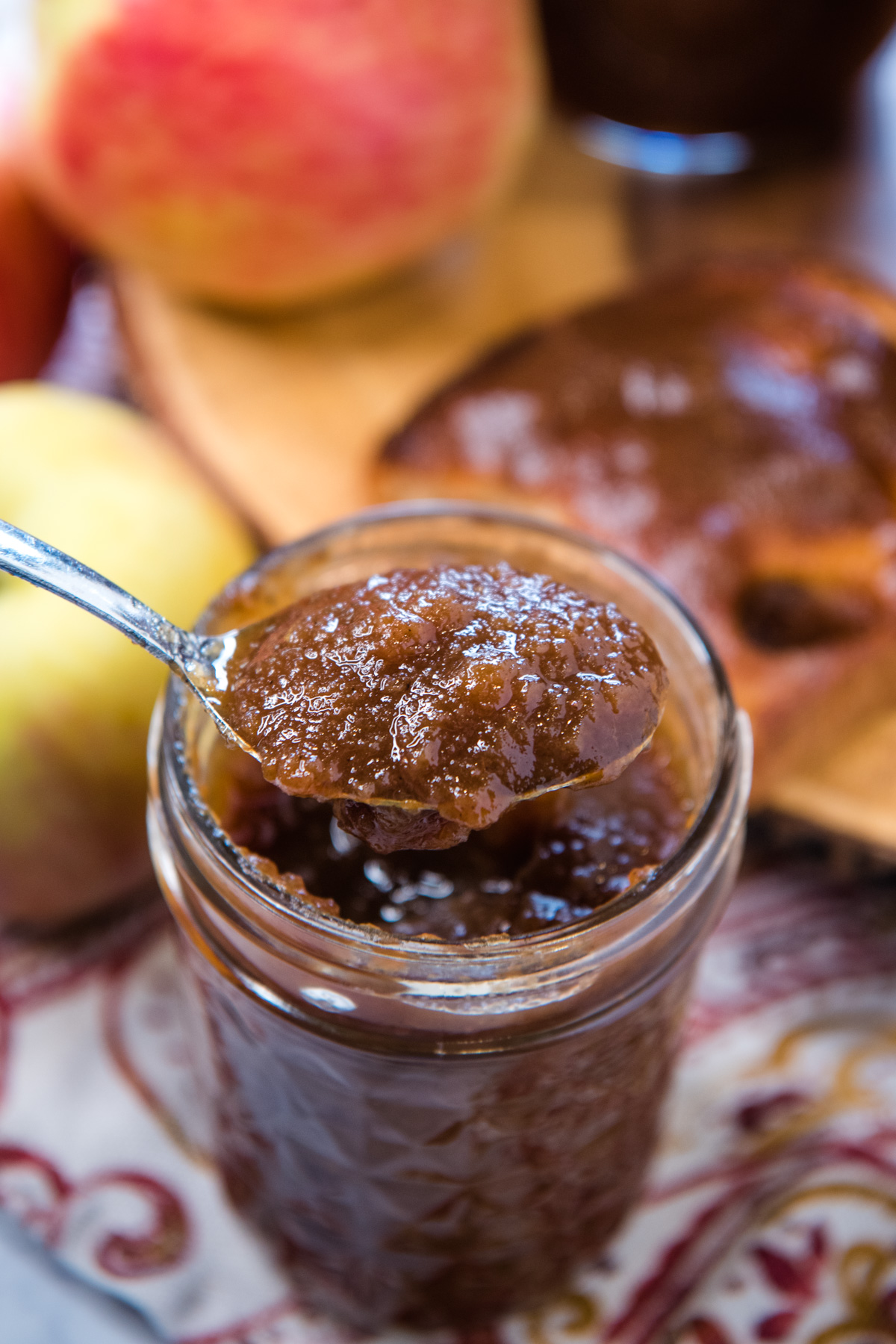 spoonful of Instant Pot apple butter over jelly jar