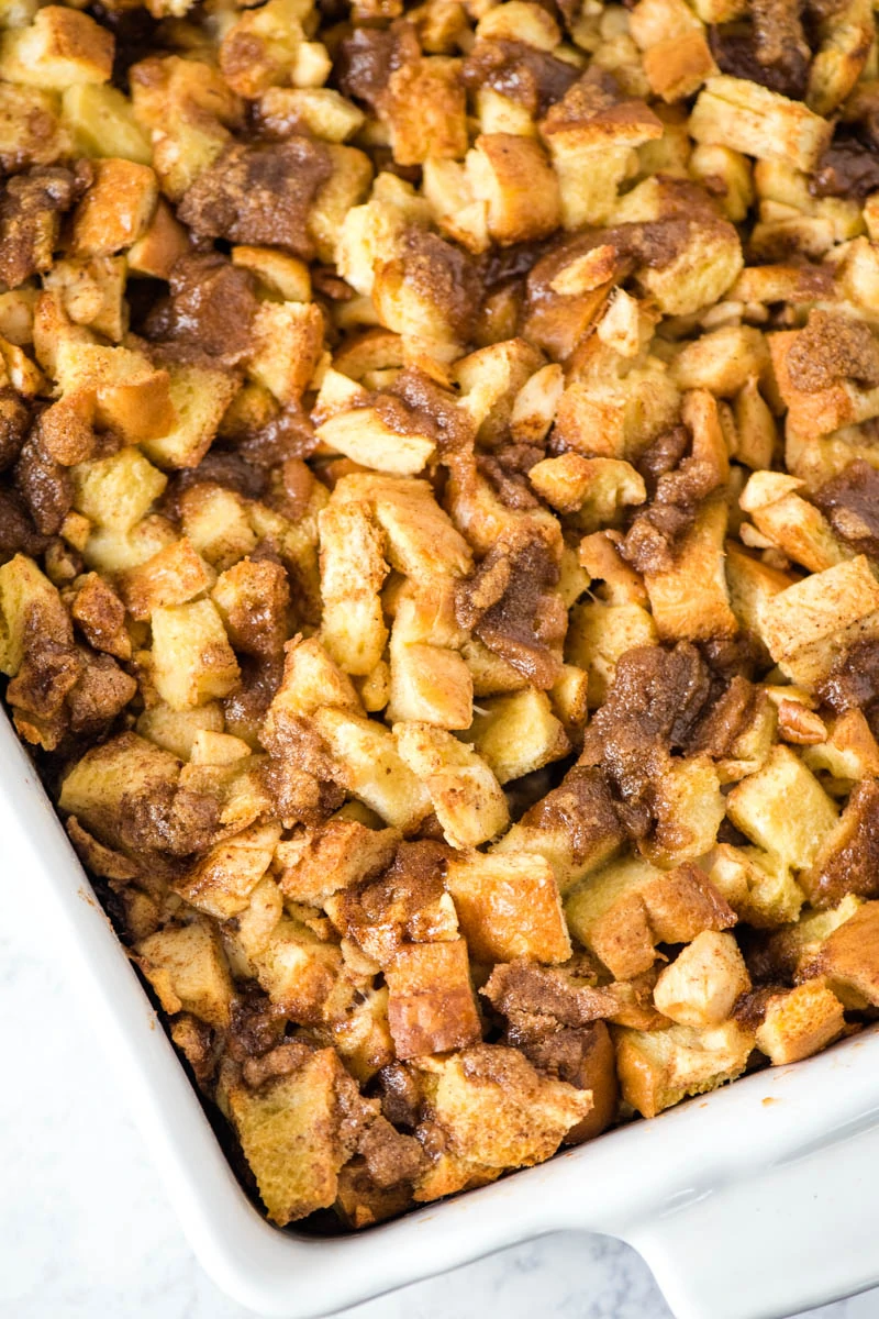 apple French toast bake, baked in white casserole dish