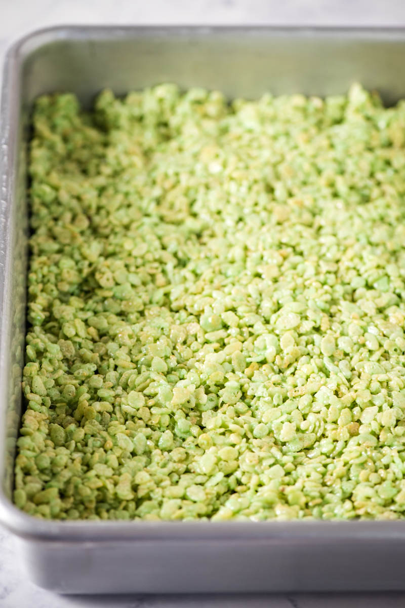green Rice Krispie treats in metal baking dish