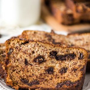 slice of chocolate chip banana bread on a small white plate