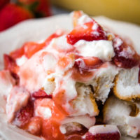 serving of strawberry angel food cake dessert on white plate