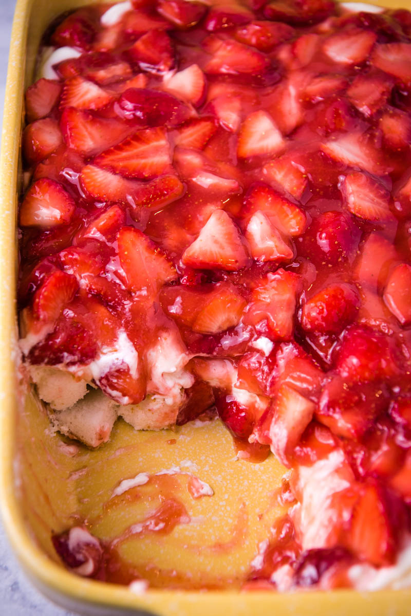 strawberry delight with angel food cake layered in yellow baking dish