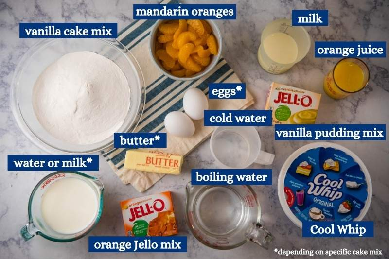 ingredients for orange Jello cake in various bowls on white marble countertop