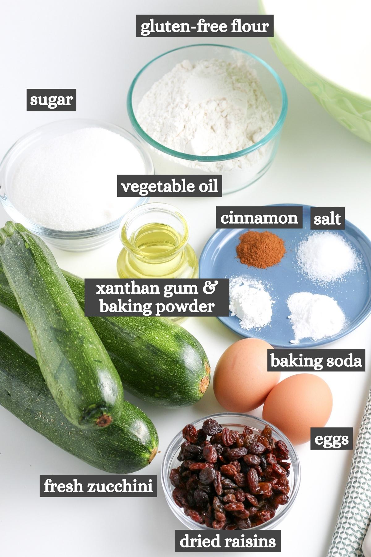 gf zucchini muffins ingredients on white countertop