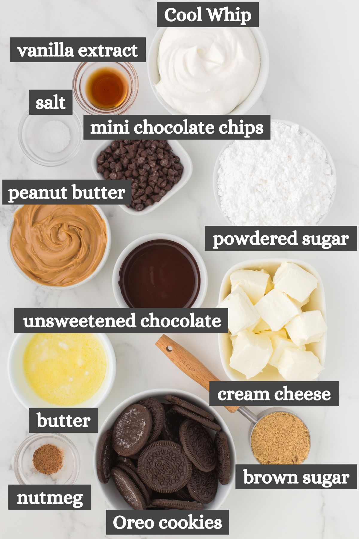 no bake peanut butter pie recipe ingredients lined out on a marbled white countertop