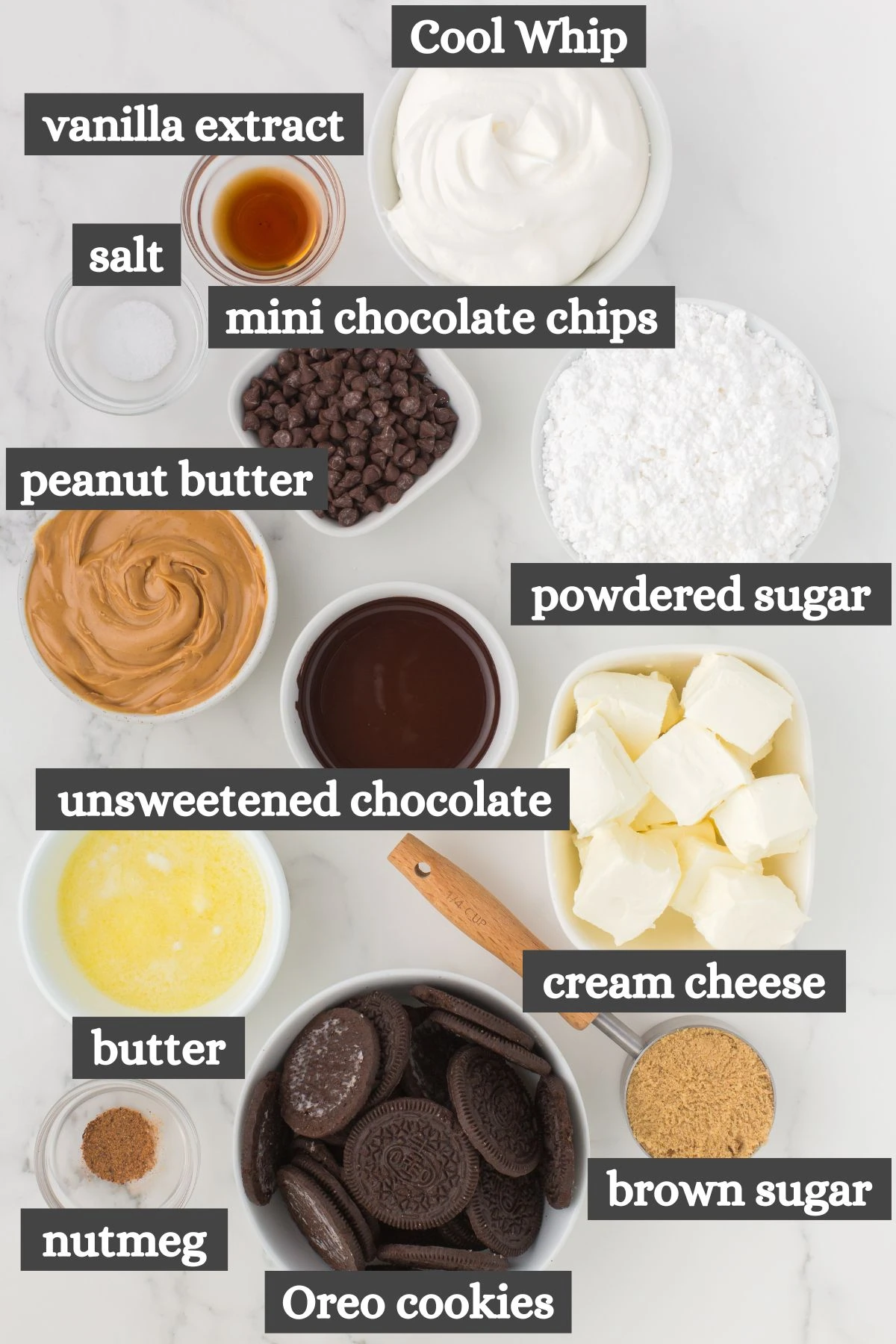 no bake peanut butter pie recipe ingredients lined out on a marbled white countertop
